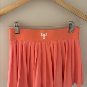 TNAction coral skort (xs)
